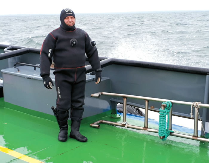 Diver before diving to unload an oil tanker